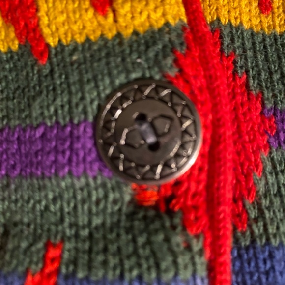 A Southwestern style sweater jacket with 5 silver colored buttons. - Picture 4 of 5